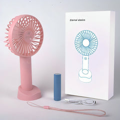 VENTILADOR DE MANO CON BASE Y PILA   FS-1106